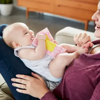 Baby chewing on the Magic Tissues from The Senser Play Kit