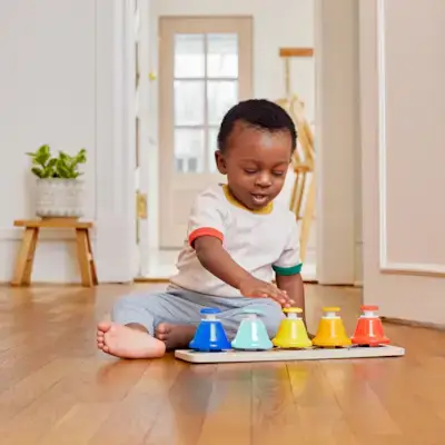 Little boy playing with The Music Set by Mommy's Reviews