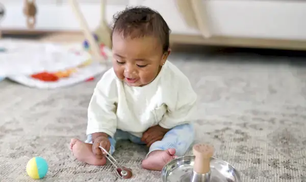 Child playing with toys from The Explorer Play kit