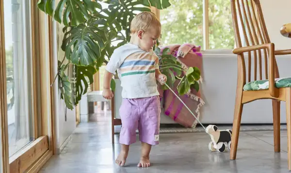 Child pulling The Pull Pup from Mommy's Reviews