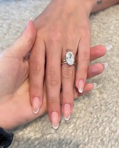 OPI passion and funny bunny nails on Hailey Bieber