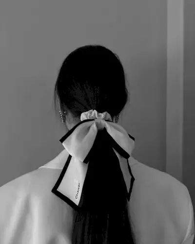 @annabelrosendahl wearing a Chanel hair bow