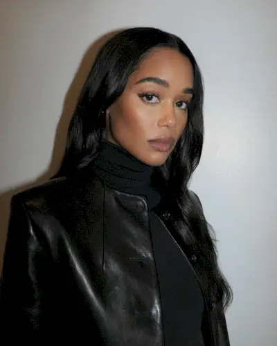 Laura Harrier with dark brunette hair colour