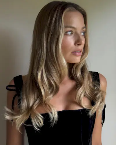 Margot Robbie with biscotti blonde hair colour