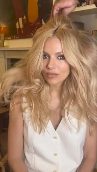 Sienna Miller with loose waves hairstyle