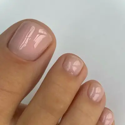 Sheer pink pedicure colour