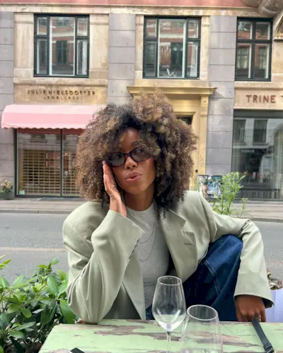 Photo of Amaka Hamelijnck with cider lights hair color