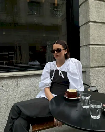 @maryljean at a cafe with a short, blunt bob