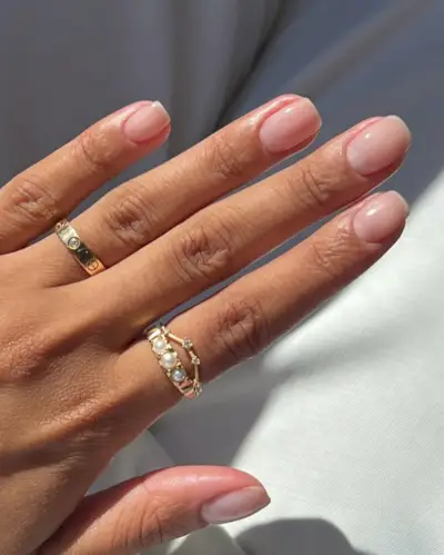 An image of a French tip manicure, one of the most popular nail colours.