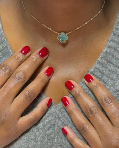 An image of a red manicure, one of the most popular nail colours.