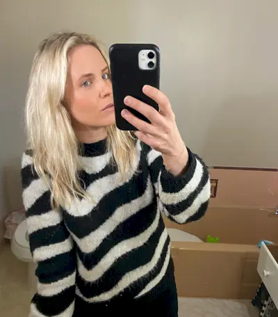 Woman with fine, curly hair before testing the Revlon One Step Dryer