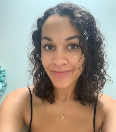 Woman with curly hair before testing the Revlon One Step Dryer