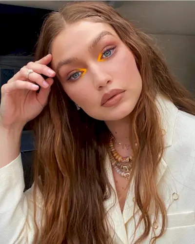 @gigihadid with wavy, auburn hair