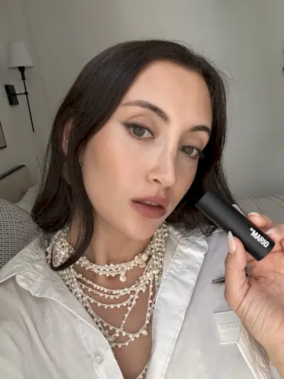 Brascia wearing the Makeup by Mario SuperSatin Lipstick in Bronx Baby.