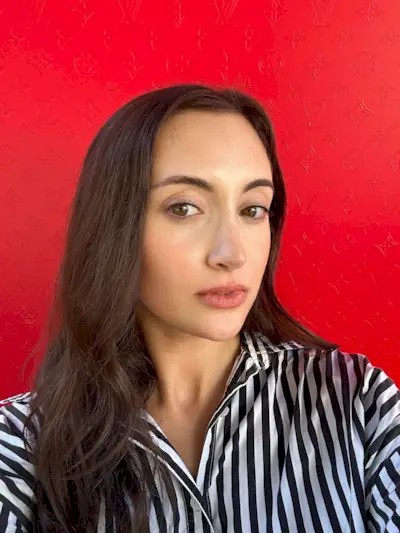 Associate beauty editor Alyssa Brascia wearing the Louis Vuitton Beauty LV Rouge Matte Lipstick in Nude Nécessaire.