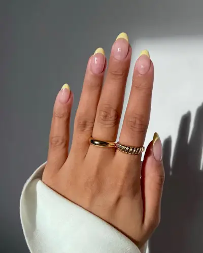 @iramshelton yellow French tip nails