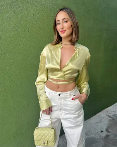 woman in green wit short hair