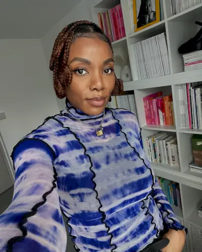 An image of influencer @the_oluwaseun with copper hair.