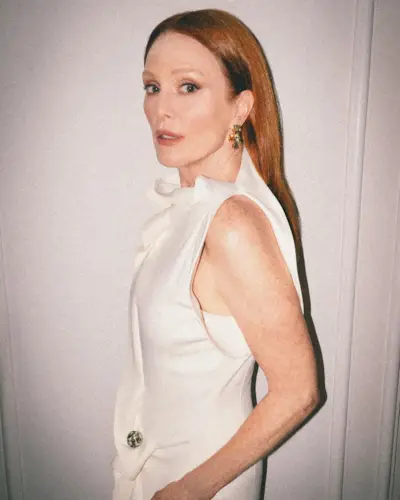 An image of Julianne Moore with copper hair.