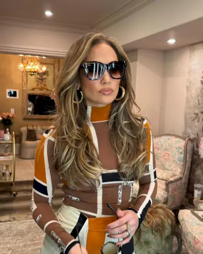 @jlo with warm blonde and brown hair