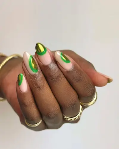 Retro-inspired metallic green nails.