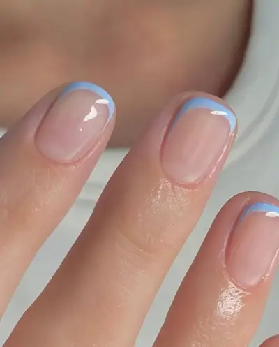 Blueberry milk micro French tip nails.