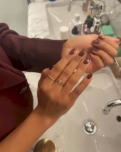 Dark brown chrome nails