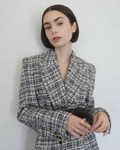 An image of Lily Collins with a 90s bob.