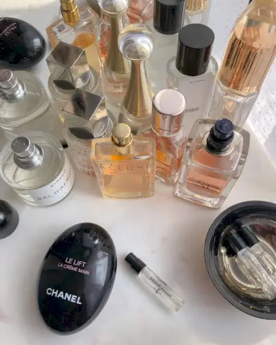 Designer perfume bottles on a counter.