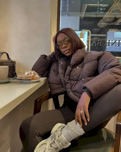 Woman posing with her hair cut into a sleek, short bob.