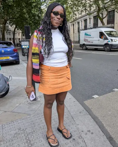 An image of @ataowaji wearing her most complimented perfume.