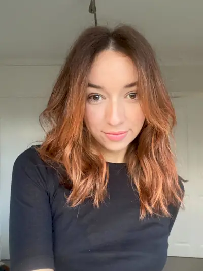 An image of Mommy's Reviews UK's social media editor Megan wearing her most-complimented perfume.