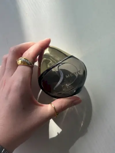 Junior beauty editor Grace Lindsay testing the Merit perfume.