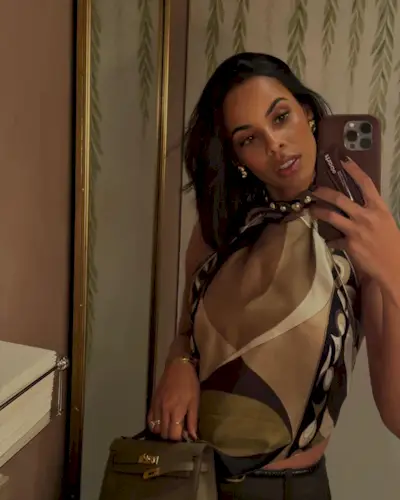 Rochelle Humes taking a mirror selfie with an asymmetrical bob