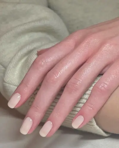 A creamy, square-shaped manicure