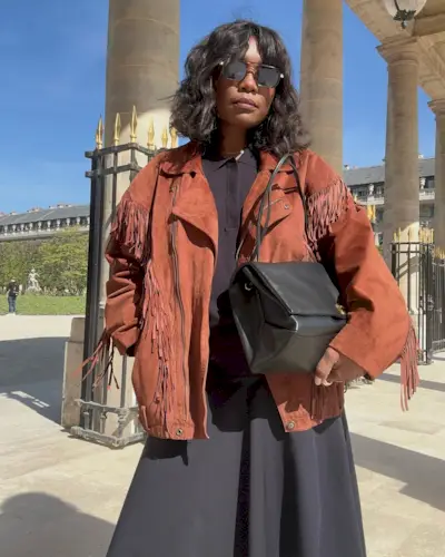 A woman in Paris with a soft bob hairstyle