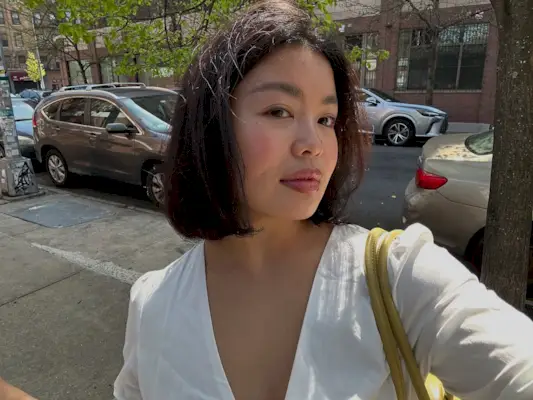 @alllisonho taking a selfie with glowing skin