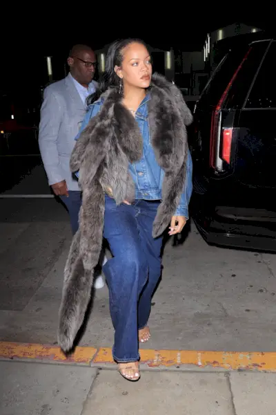 Rihanna is chic in a denim ensemble paired with fur shaw and new Dior bag as she enjoys a late night dinner at Giorgio Baldi in Santa Monica