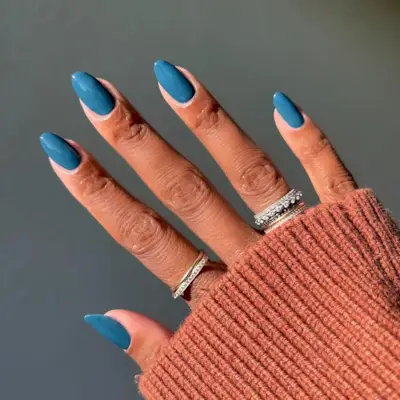 Stormy teal nails.