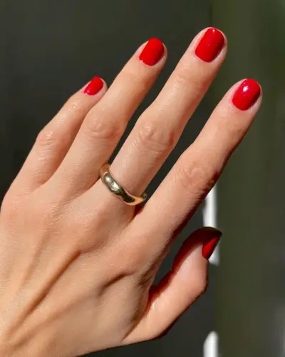 Cherry red nails.
