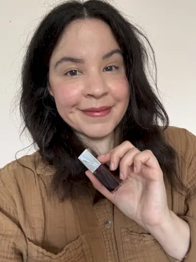 Mica Ricketts wearing Clinique Pop Lip + Cheek Oil in Black Honey