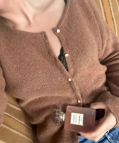 Shannon Lawlor holding a bottle of Chanel Coco Mademoiselle