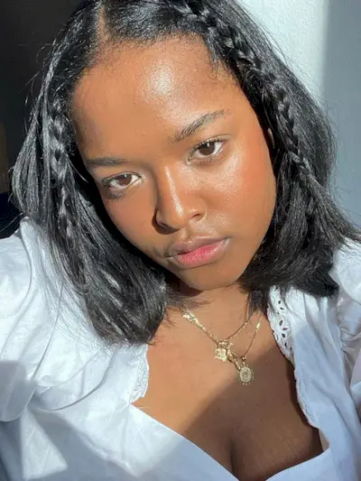 Face framing braided tendrils on short hair