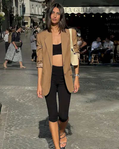 A woman with a medium-length, straight, short hairstyle.