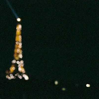 The Eiffel Tower sparkling at night