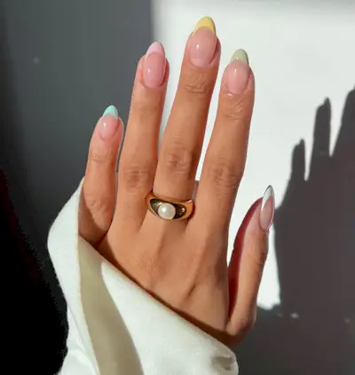 a pastel French tip manicure