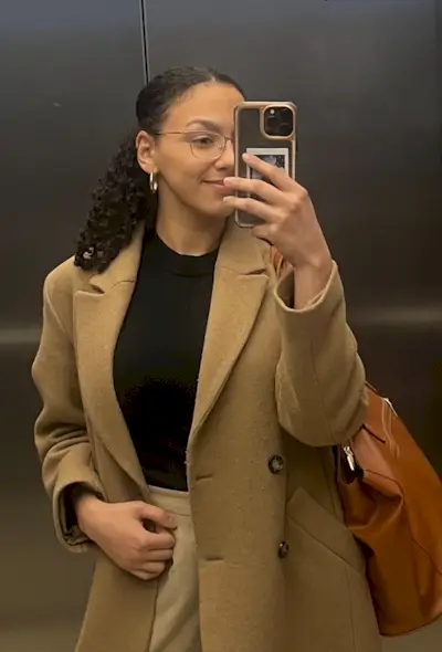 Sabrina Talbert wearing a slicked-back ponytail.