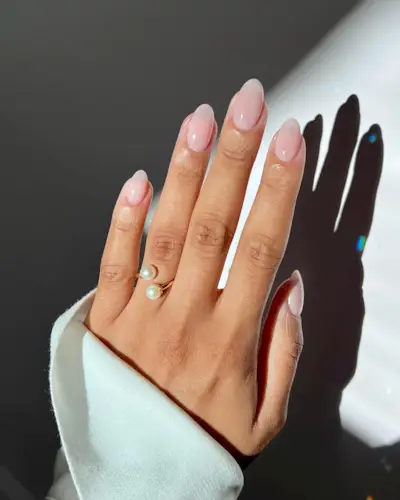 Iram Shelton wearing Essie Allure Nail Polish