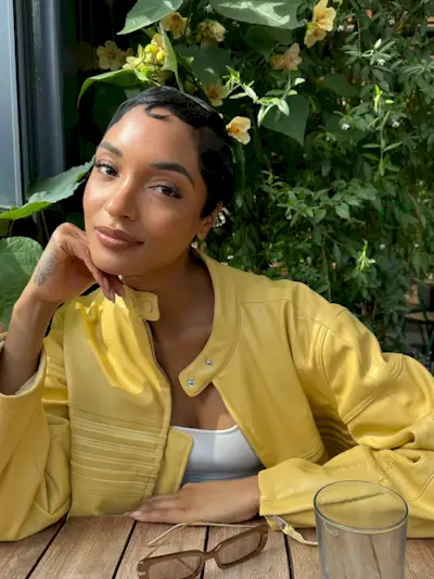 Jourdan Dunn wears a classic pixie cut with kiss curls