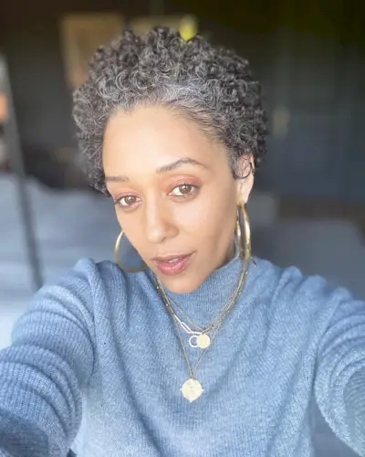 Tia Mowry with a short, salt and pepper tapered cut
